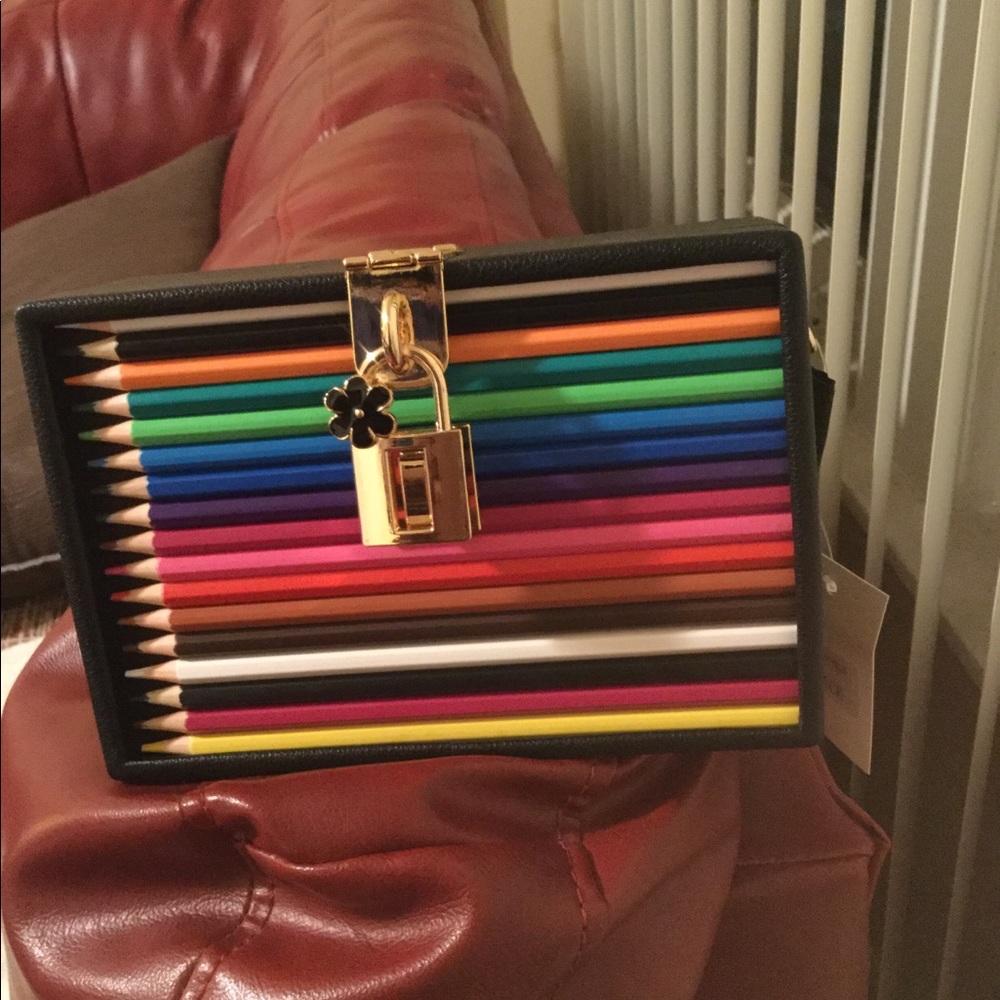 Black pencil box purse .